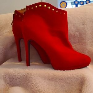 Red ankle Mossimo boots with gold studs size 11.